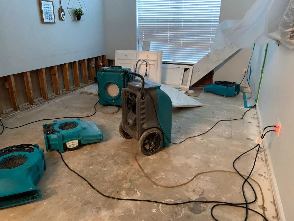 Dehumidifier in flood-cut room for Water Damage Restoration in Ogden